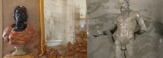 Composite photograph. The image to our left shows a man’s head and neck carved from highly polished black stone, which is set into orange and red mottled stone carved into a cloak. The man’s noticeably wide-set eyes have white stone inlaid to create the sclera. His lips are parted to show a sliver of bright red tongue. It sits next to a gilded, antique mirror, in which the carved Torso of Pan is reflected. The Torso of Pan is then illustrated to our right. It shows a nude, muscular man with a long beard holding a set of pipes.