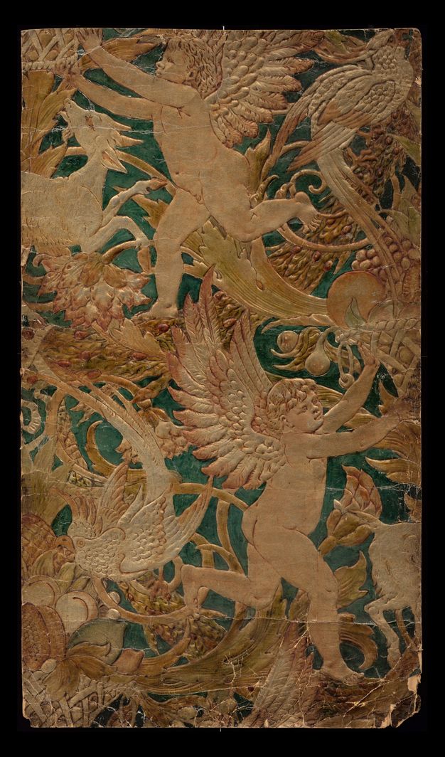 Embossed and painted plaster. In low relief, two winged, child-like putti reaching for fruit growing on trees are surrounded by animals, birds, plants, and flowers. The background is painted deep turquoise blue. The raised, embossed areas are painted in tones of pale peach, yellow, and white.